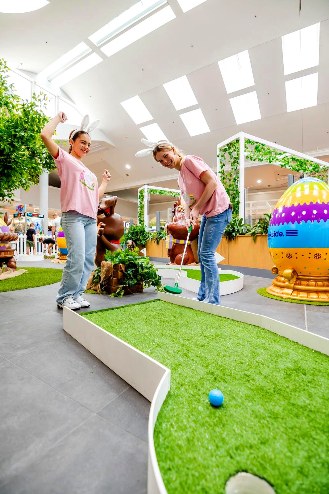 Activation ambassadors running an Easter mini golf activation in a shopping centre
